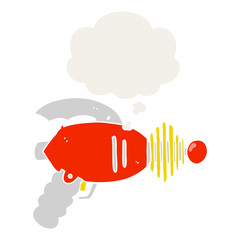 cartoon ray gun and thought bubble in retro style