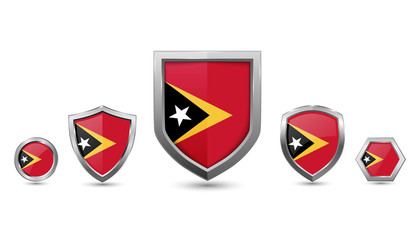 set of East timor country flag with metal shape shield badge