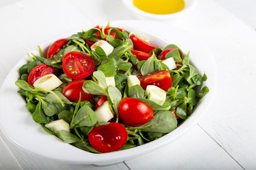 Purslane salad with tomatoes and cucumbers