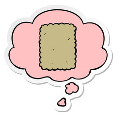 cartoon biscuit and thought bubble as a printed sticker