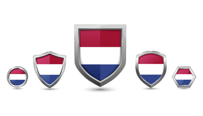 Fototapeta premium Set of Netherlands country flag with metal shape shield badge