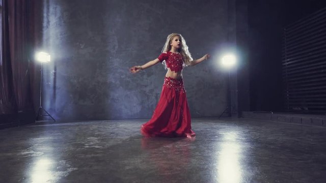 Beautiful girl dancing Turkish belly dance
