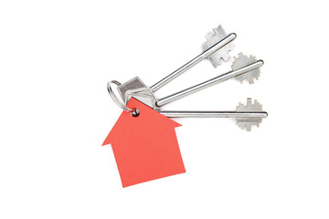 Silver keys with paper house isolated on white background
