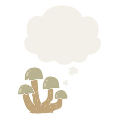 cartoon mushroom and thought bubble in retro style