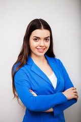 Portrait of beautiful young woman with serious look