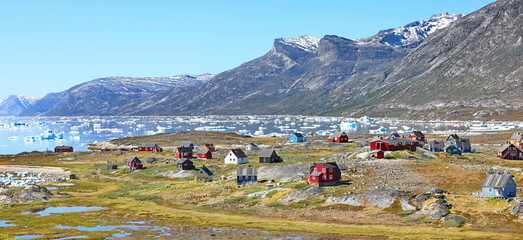 Abandoned fishing village, landscape Greenland, beautiful Nuuk fjord, ocean, iceberg with mountains background © dule964