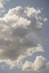 White Puffy Clouds on a Clear Blue Sky