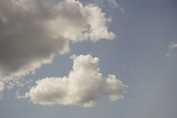 White Puffy Clouds on a Clear Blue Sky