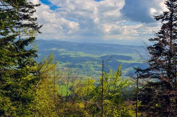 Beautiful spring green landscape. View of the charming villages in the mountains.