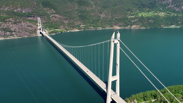 The Hardanger Bridge is a suspension bridge across the Eidfjorden branch of Hardangerfjorden in Hordaland county, Norway.