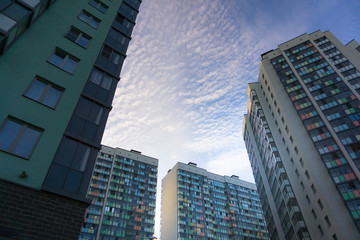 Fototapeta na wymiar High-rise buildings against the blue sky