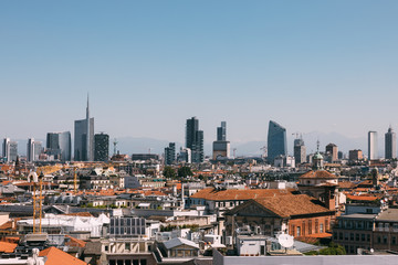 Fototapeta na wymiar Panoramic view of Milan city with modern buildings from Milan Cathedral
