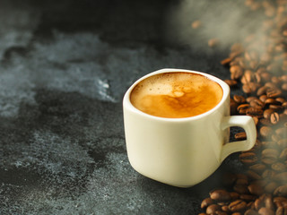 coffee in a white cup. food background. top