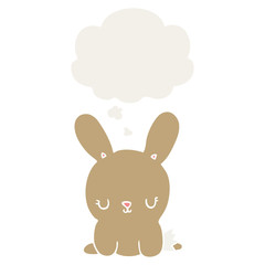 Obraz na płótnie Canvas cute cartoon rabbit and thought bubble in retro style