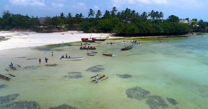 People buying fresh fish from local fisherman. Kizimkazi. Zanzibar, Tanzania. 