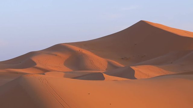 Erg Chebbi desert with two lost tourists