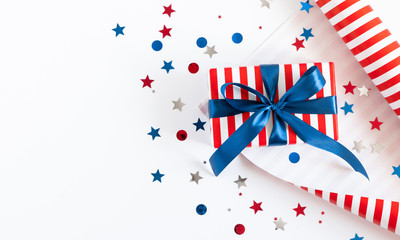 Fototapeta premium 4th of July American Independence Day. Happy Independence Day, decorations on white background. Flat lay, top view, copy space
