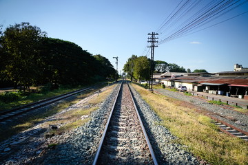Obraz premium railway in mountains beside with old house