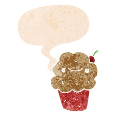 cartoon cupcake and speech bubble in retro textured style