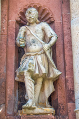 Obraz premium Statue at Historic gate Castle and Monastery Corvey (Kloster Corvey) UNESCO world heritage (Weltkulturerbe) Höxter North Rhine-Westphalia