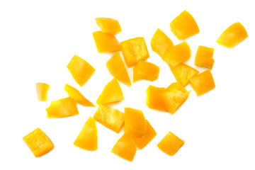 cut slices of yellow sweet bell pepper isolated on white background top view