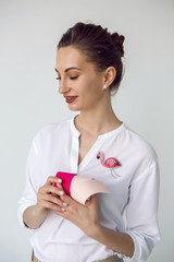 young attractive beautician aesthetician woman in white shirt