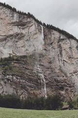 View closeup waterfall Staubbach fall in mountains, valley of waterfalls