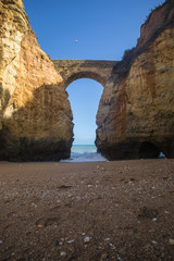 Roman bridge on Student beach, Lagos, Portugal