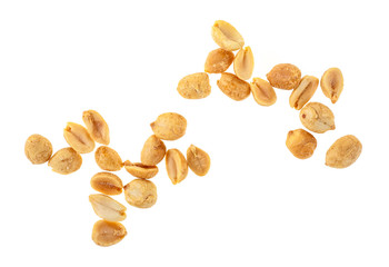 Roasted salted peanuts isolated on a white background, top view.