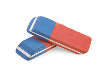 Two erasers isolated on a white background, close up.