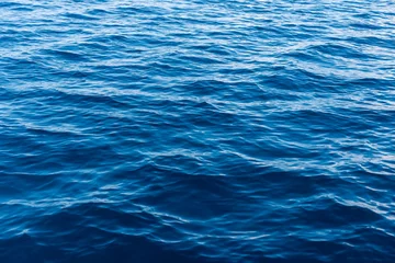 Foto auf Alu-Dibond Sea water surface texture. Deep sea waves © byrdyak