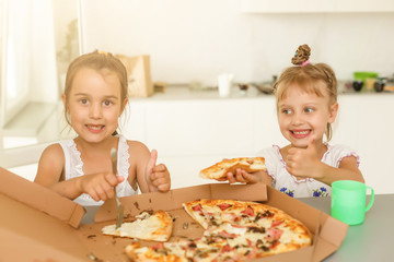 Obraz na płótnie Canvas Two friends holding pizza - having fun eating dinner - Rebel concept - Focus on left slice