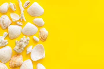 Seaside pattern with shells on yellow background top view mock up