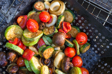 Cooking vegetables on the grill. Vegetables on the fire.