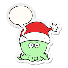 cartoon octopus wearing christmas hat and speech bubble sticker