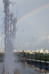 Frozen drops of water. Rainbow. Cityscape of Yekaterinburg, Russia.