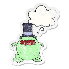 cartoon toad wearing top hat and thought bubble as a distressed worn sticker