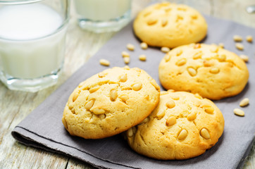 Italian pine nuts cookies with glasses of milk