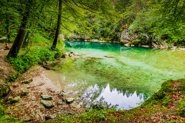 Obraz premium private isolated spot by the water in slovenia