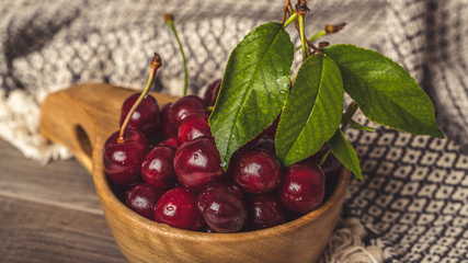 Fresh suur cherries  in rustic bowl