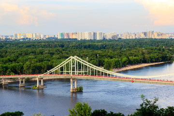 bridge with people across the river