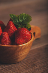 Fresh nice strawberries on wooden rustic table