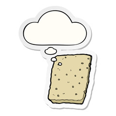 cartoon biscuit and thought bubble as a printed sticker