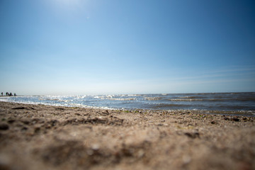Lying in the sand at North Sea Coast