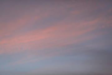 Obraz premium beautiful pink and blue colous sky clouds at sunset