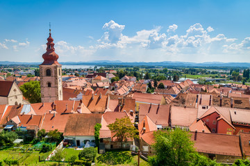 panoramic view of Red roofs of the beautiful towns in Czech republic in summer time with green nature around