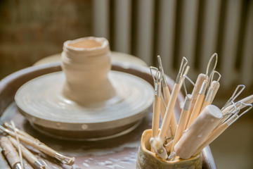  close-up of clay and pottery tools for modeling