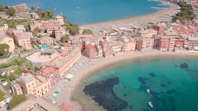 aerial view of amazing natural bays of Sestri Levante town in Italy in sunny weather in summer, blue water