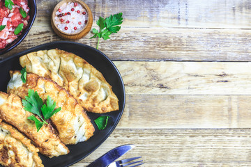 Homemade fried empanadas with tomato sauces.