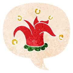 cartoon jester hat and speech bubble in retro textured style